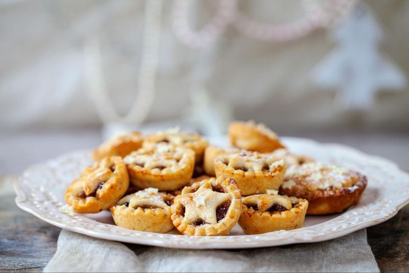 Christmas mince pies on a white plate