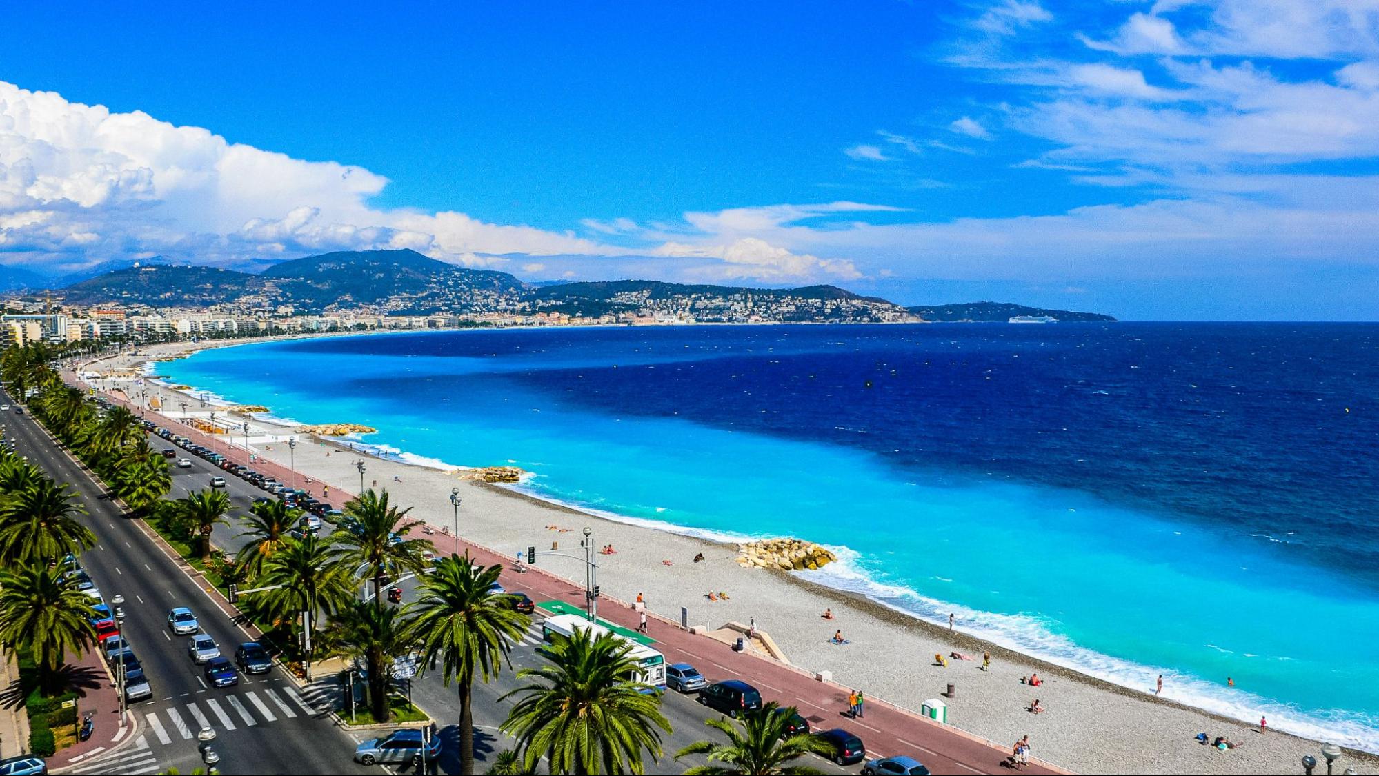 Beautiful beach in Nice with azure ocean and clear skies