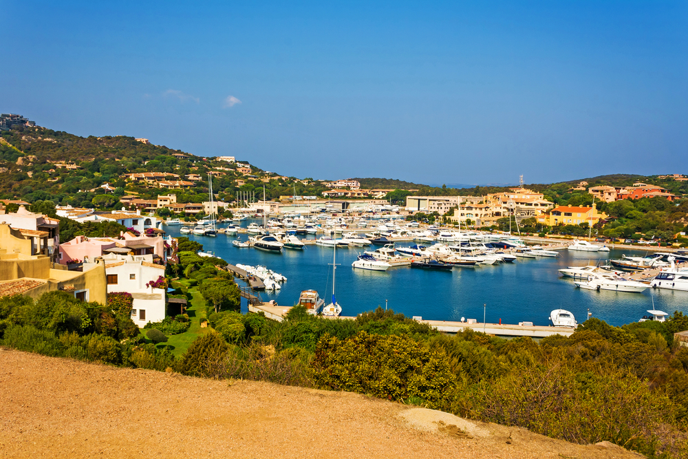 Porto Cervo in Sardinia with yachts docked on a clear day