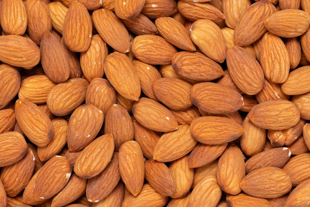 A lot of almonds covering the entire background.
